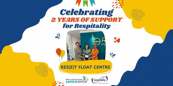 celebratory image with one of our staff handing over the respitality certificate to Reset float centre